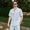 Camisa de cardigan de solapa de manga corta para hombres de estilo europeo y estadounidense